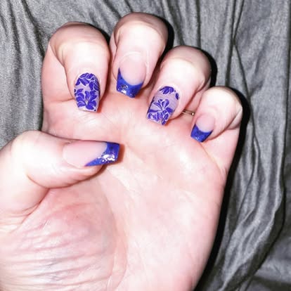 Blue custom nails with floral details