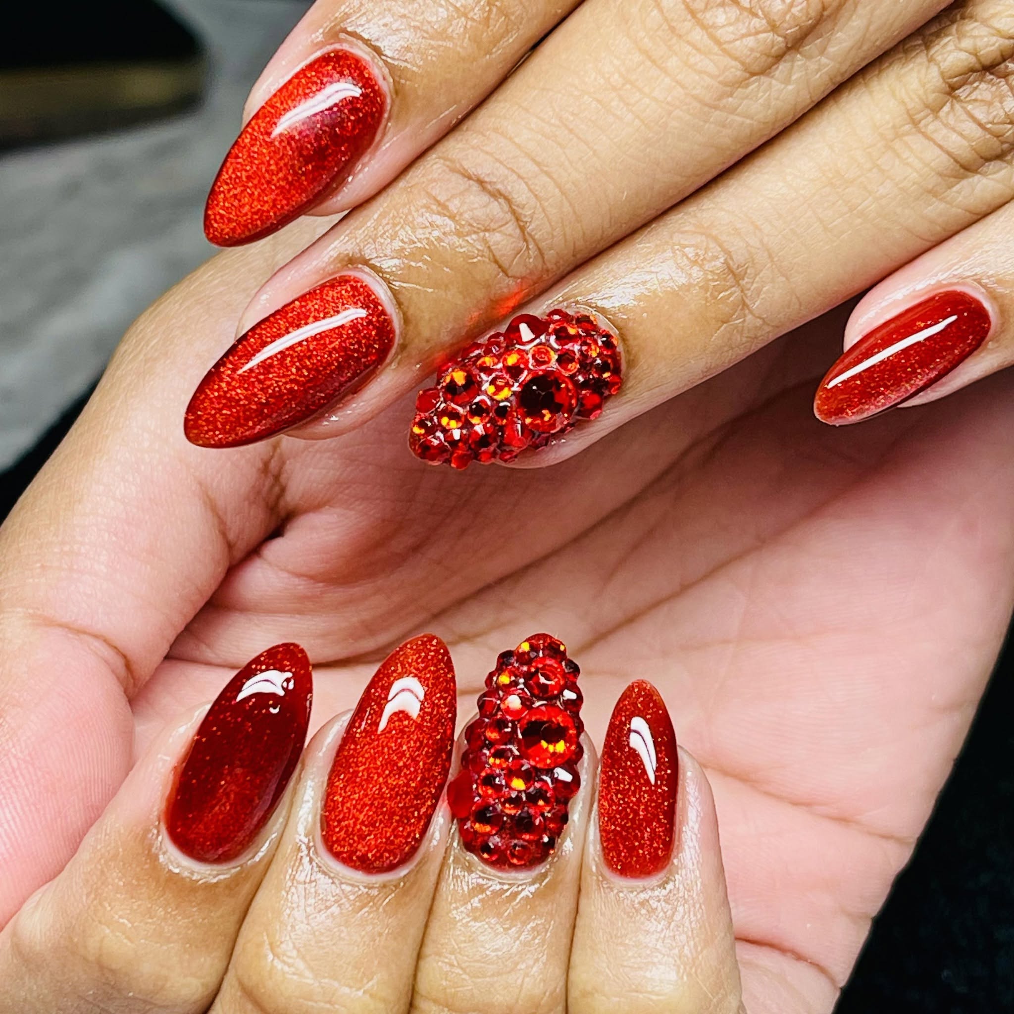 Red glitter nail set with crystal accent nails